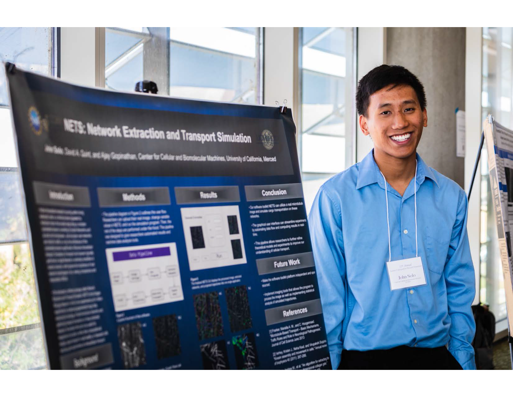 student with poster
