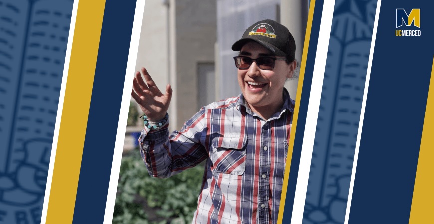 Photo depicts UC Merced graduate Adamaris Alvarez in a black hat on a blue and gold graphic background.
