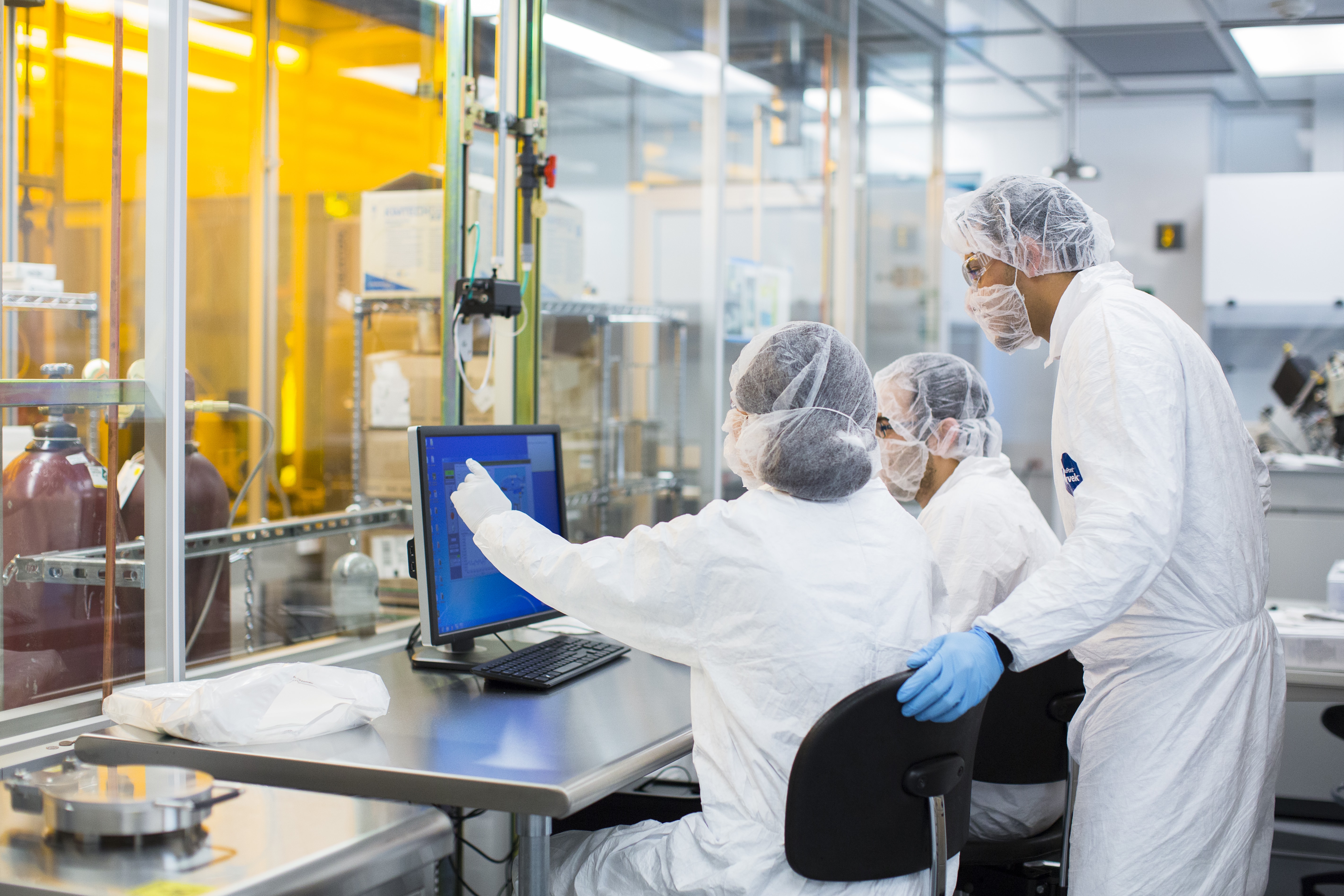 Trhee researchers in the SCIF