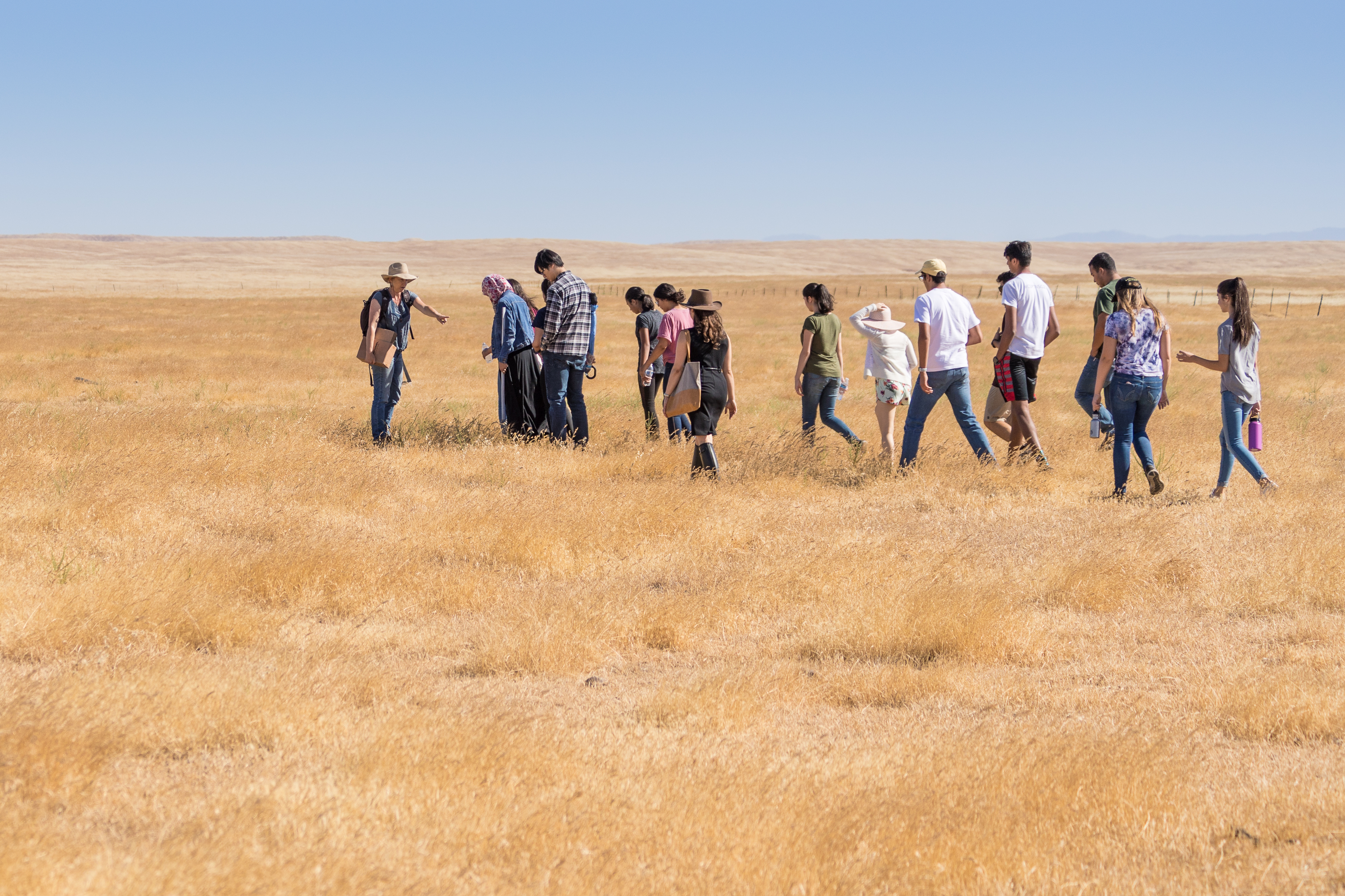 Director of Merced Vernal Pools and Grasslands Reserve, Dr. Monique Kolster, leads STEP participants on tour of the reserve with CCBM Programs Manager, Nora Cole - June 14, 2018